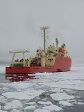 The research vessel NATHANIEL B. PALMER (NBP) sits in ice in the Ross Sea. The Research Vessel LAURENCE M. GOULD is used by U.S. Antarctic Program scientists to support research including oceanography, benthic studies and marine biology.