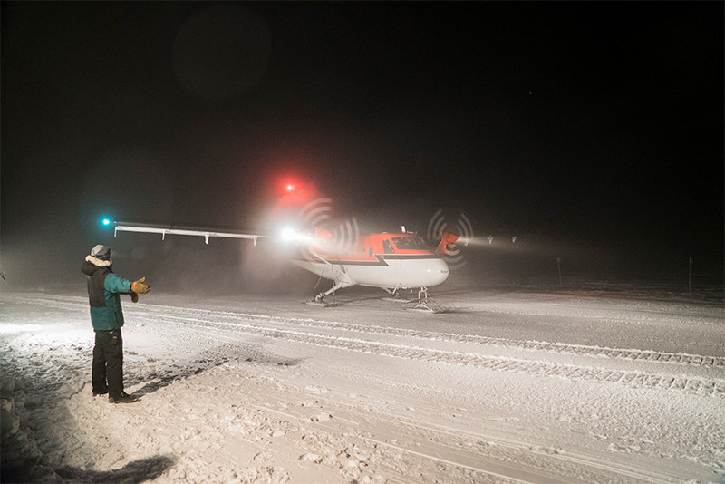 A Twin Otter aircraft on a medical evacuation flight taxis on the skiway at NSF's Amundsen-Scott South Pole Station