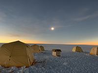 Solar Eclipse at WAIS Divide. Photo by Jesse Norquay, courtesy of the NSF/USAP Photo Library. Creative Commons CC BY-NC-ND 4.0