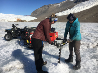Limno team drills a hole in Lake Bonney. Photo by Emily Reynebeau.