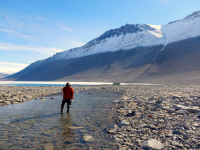 MCM LTER stream team member measures discharge in the Onyx River above Lake Vanda, Wright Valley. Photo by Michael Gooseff.
