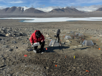 Measuring microbial mat responses to experimental wetting and warming. Photo by Byron Adams.