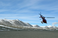 Helicopter flying into New Harbor, Victoria Land, Antarctica. Photo by Peter Rejcek, courtesy of the USAP Photo Library.