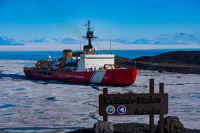 The U.S. Coast Guard heavy icebreaker Polar Star makes its way toward McMurdo Station. Photo by Heath McFarland, courtesy of the USAP Photo Library.
