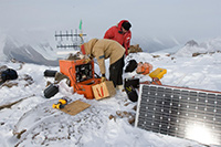 USAP personnel check the equipment at Lake Bonney field camp