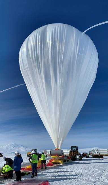 Close image of GUSTO balloon inflating
