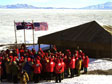 A crowd gathers at Scott's Discovery Hut near McMurdo Station.